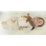 A German Franz Schmidt Simon & Halbig doll with blue sleep eyes, 55 identification mark, circa