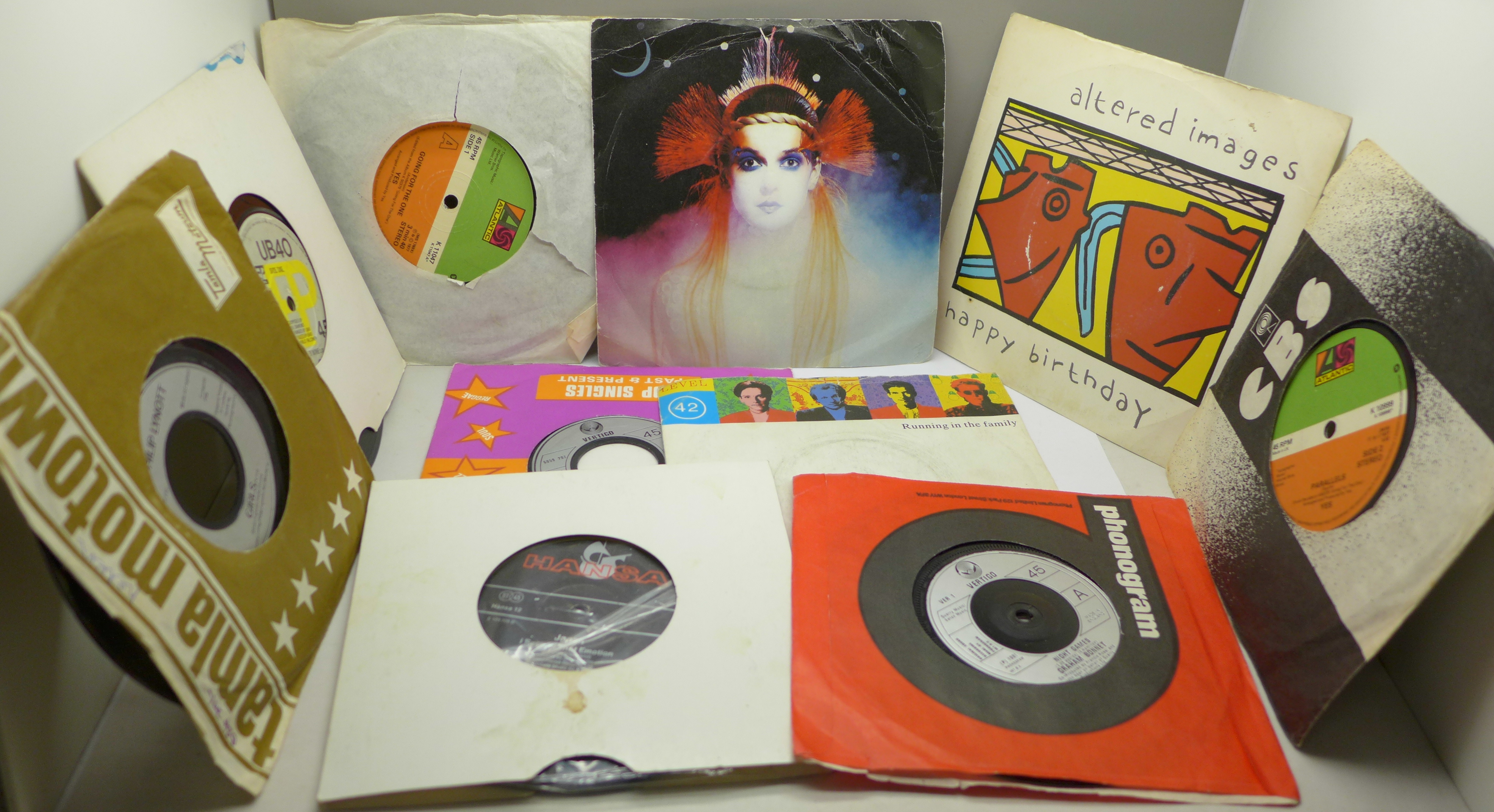 Thirteen rock and pop 7" vinyl singles