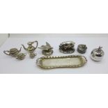 A silver covered pig, a/f, a bird, two pots and a miniature doll's house tea service