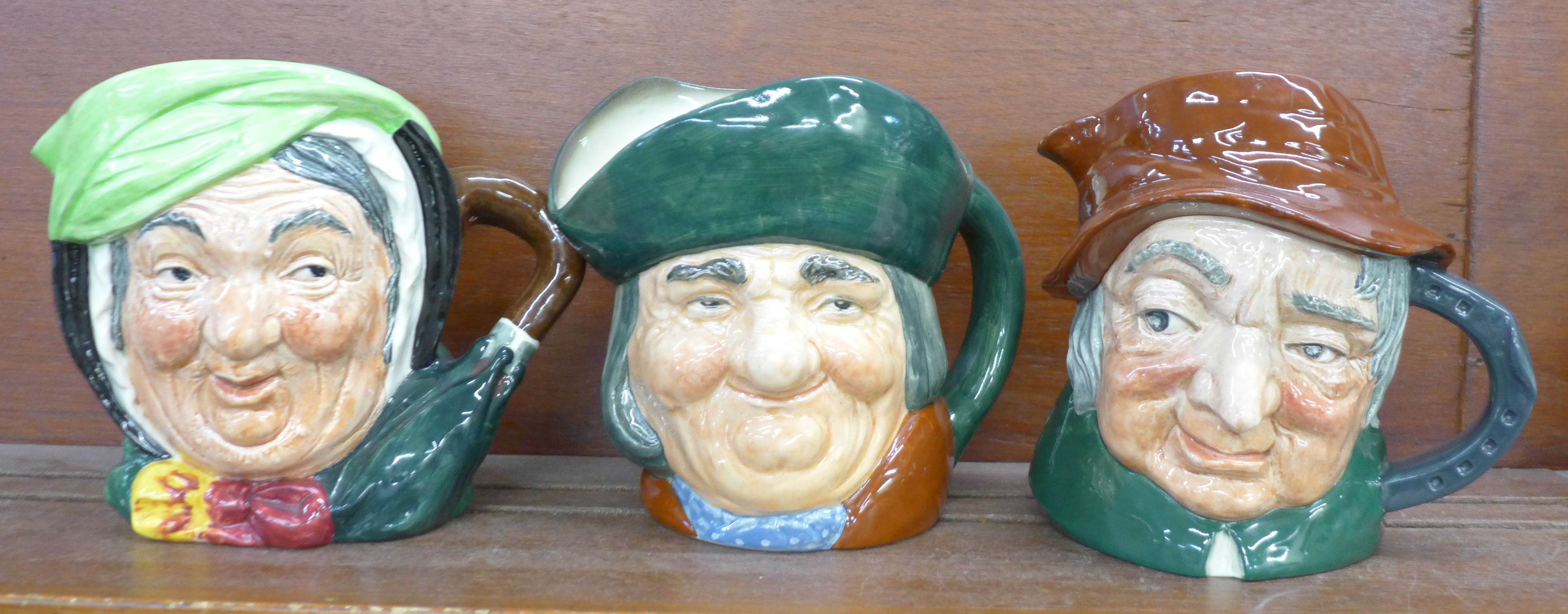 Three Royal Doulton large character jugs, Sairey Gamp, Toby Philpots and Uncle Tom Cobbleigh, two