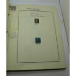 Stamps; an album with Victorian and later stamps including one penny black, eight two-penny blue and