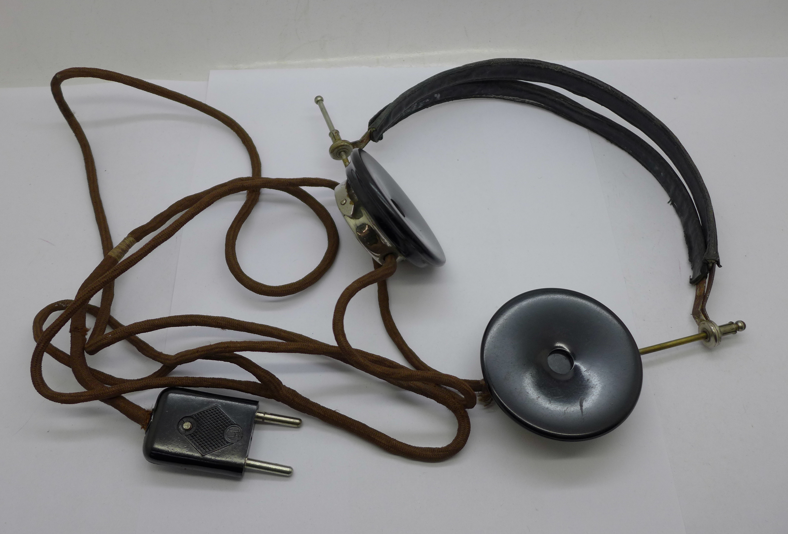 A pair of German headphones, marked N&K, Neufeldt & Kuhnke Kiel