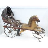 A wooden horse and carriage, one ear a/f
