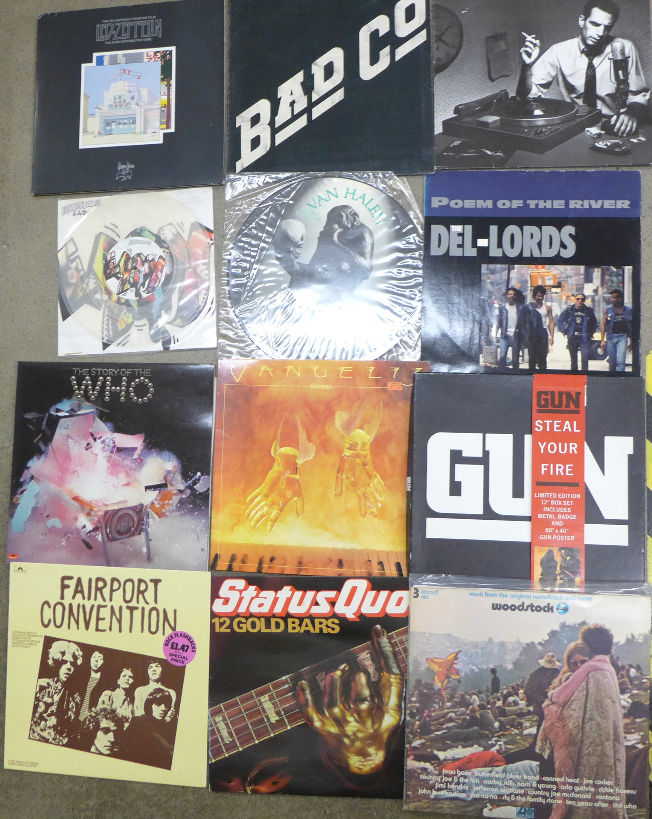 A collection of twelve LP records, Led Zeppelin, Woodstock, Bad Co, Donald Fagen, etc.