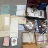 Assorted items including pens, badges, cigars and legal documents