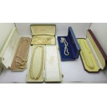 A collection of pearls, one with silver clasp, boxed