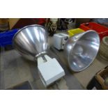 A pair of large industrial lights