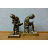 Two French style bronze figures of boys with thorn in foot, on grey marble socles