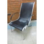 A chrome and black leather lounger chair