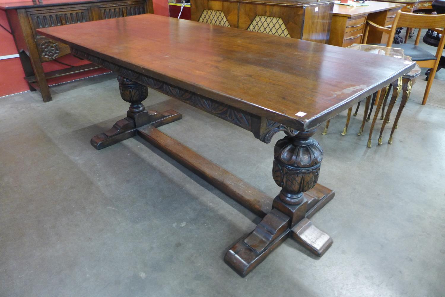 A 17th Century style carved oak refectory table