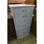 A painted pine seven drawer chest