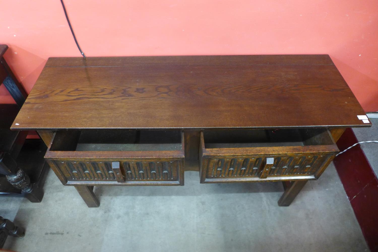 A 17th Century style carved oak two drawer dresser - Image 2 of 2