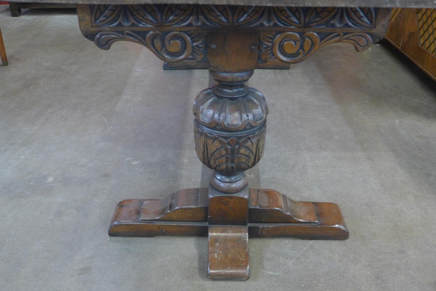 A 17th Century style carved oak refectory table - Image 3 of 4