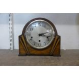 An Art Deco oak mantel clock