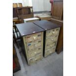 A pair of industrial style painted pine and mahogany four drawer chests