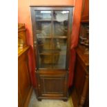 An early 20th Century oak two door bookcase