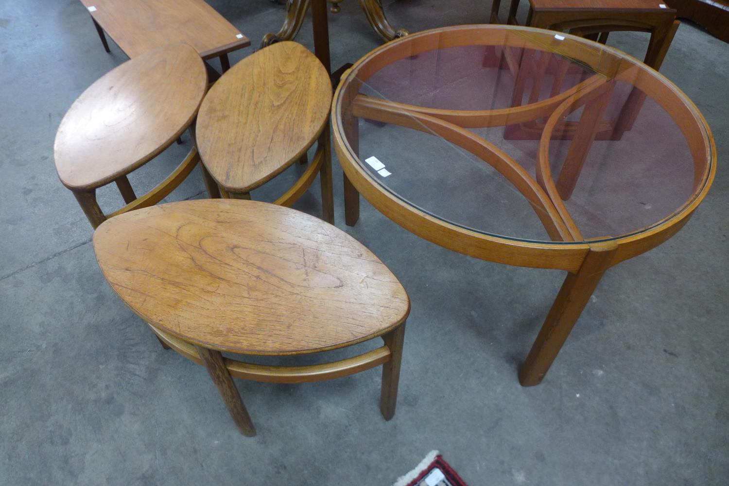 A Nathan teak and glass topped circular Trinity nest of tables - Image 2 of 2