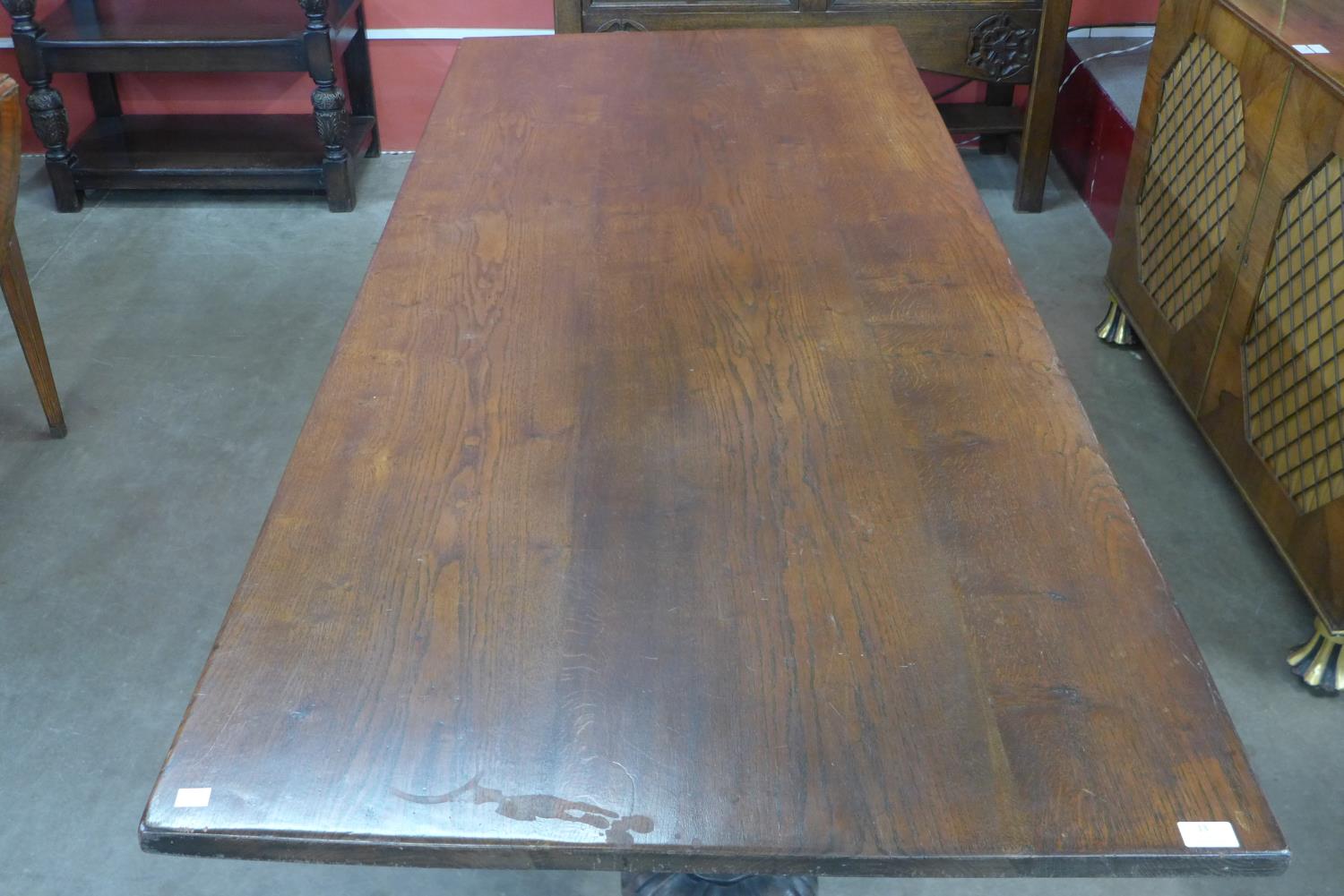 A 17th Century style carved oak refectory table - Image 2 of 4