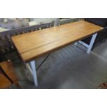 A painted pine trestle table