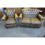 A Thomas Lloyd green leather Chesterfield settee and armchair