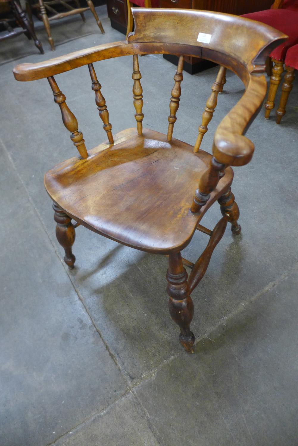 A Victorian beech smokers bow chair