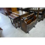 An oak nest of tables and a newspaper stand