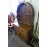 A carved oak linenfold dresser