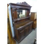 A Victorian Aesthetic Movement carved oak mirror-back sideboard