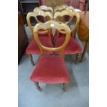A set of five Victorian mahogany balloon back chairs