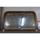 A Victorian walnut overmantel mirror