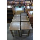 A set of six beech laboratory stools