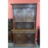 A 19th Century French Henri II style carved oak buffet