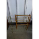 A pine towel rail and a metal towel rail