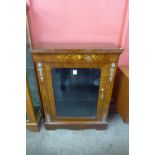 A Victorian style marquetry inlaid walnut and gilt metal mounted pier cabinet