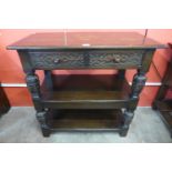 A 17th Century style carved oak three tier buffet