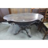 A 19th Century French rosewood two drawer serpentine centre table