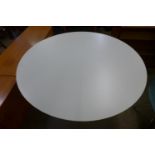 A Johanson chrome based circular table