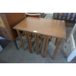 A teak nest of tables, a/f