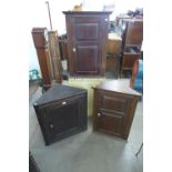 A pair of walnut hanging corner cupboards and a George III oak hanging corner cupboard