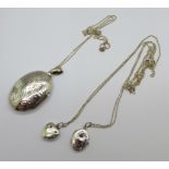 Three silver lockets and chains, 16g