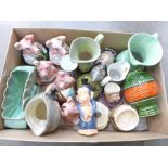 Assorted china including Royal Doulton, Wade Nat West pigs, Goebel, West German vases, face pots,