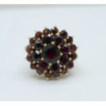 A 9ct gold and garnet large cluster ring, 5.4g, M