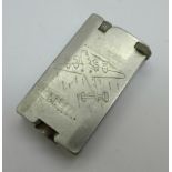 A petrol lighter, probably WWII, with an engraving of an aircraft