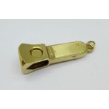 A 9ct gold mounted cigar cutter, 30.6g gross weight