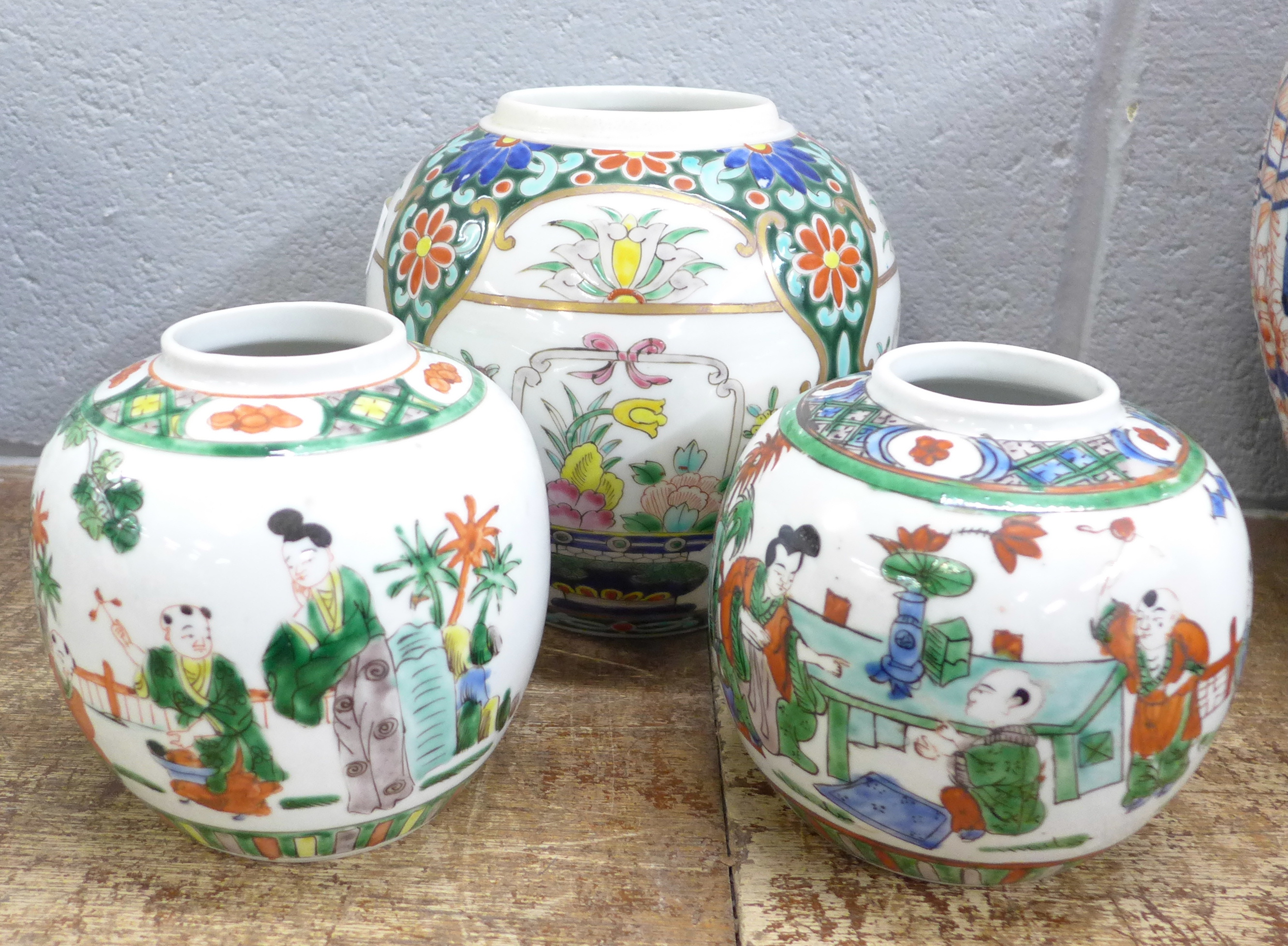 Three famille verte ginger jars, all lacking lids