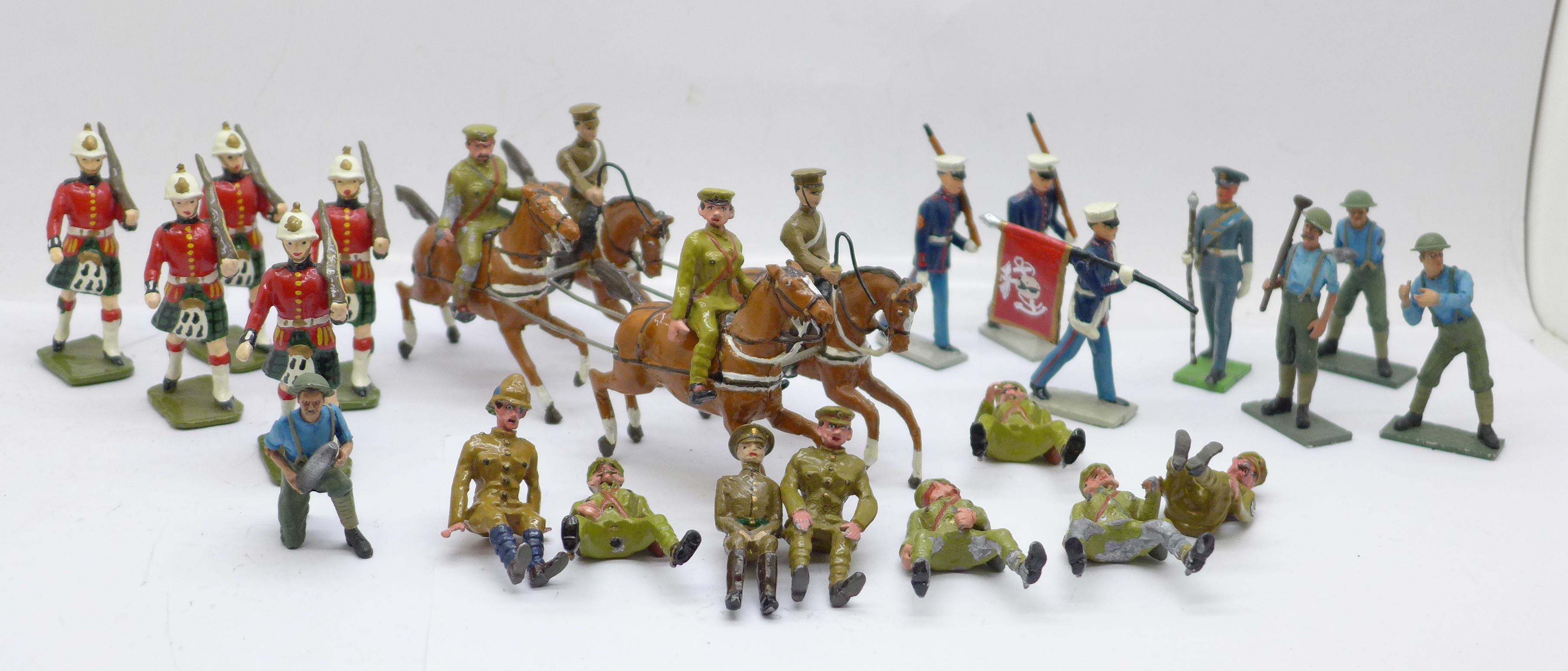 A collection of metal model military figures