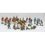 A collection of metal model military figures