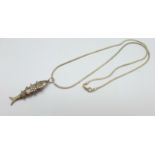 A silver articulated fish pendant on snake chain, 15g