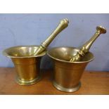 Two brass pestles and mortars