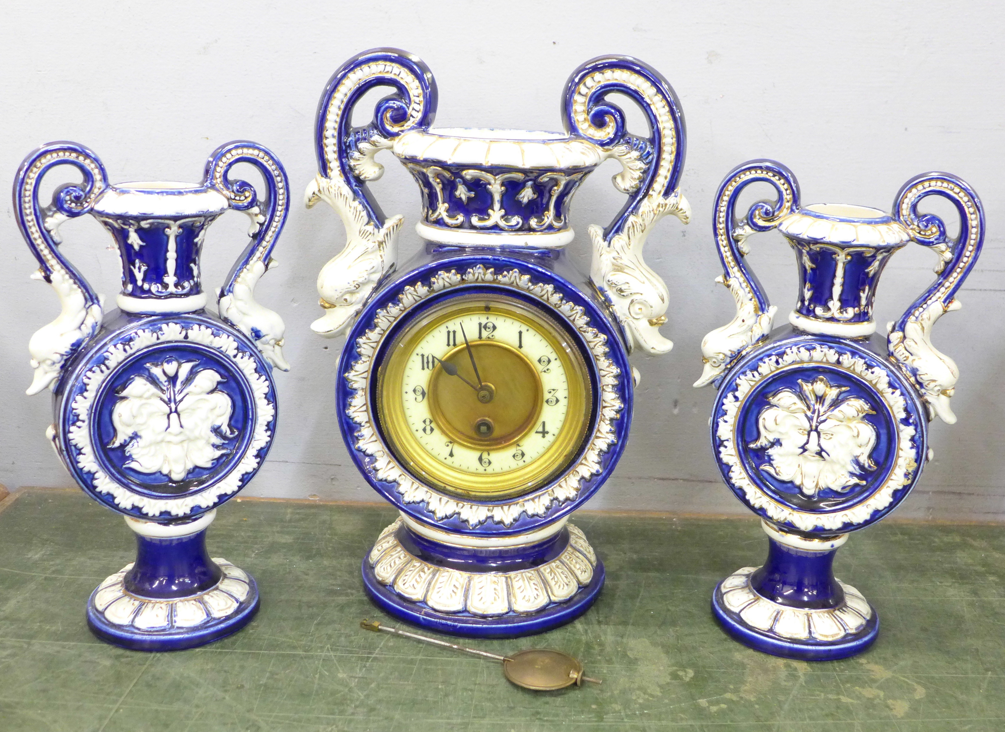 A ceramic clock garniture